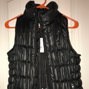 Y2K style New York&Co. black puffer vest.